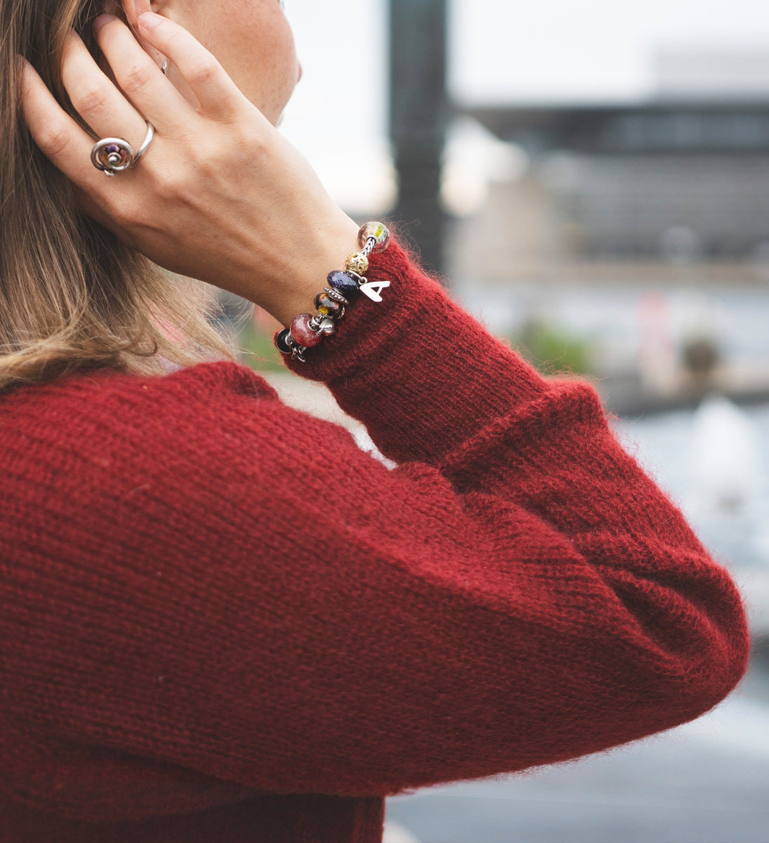 Trollbeads model wearing winter jewellery collection 2024 on ring and bracelet